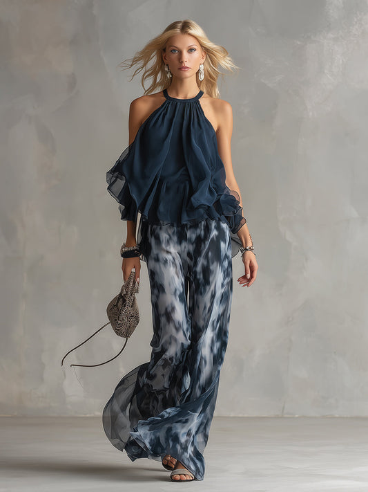 Conjunto Elegante en Chiffon con Top de Cuello Alto y Pantalones Anchos Estampados