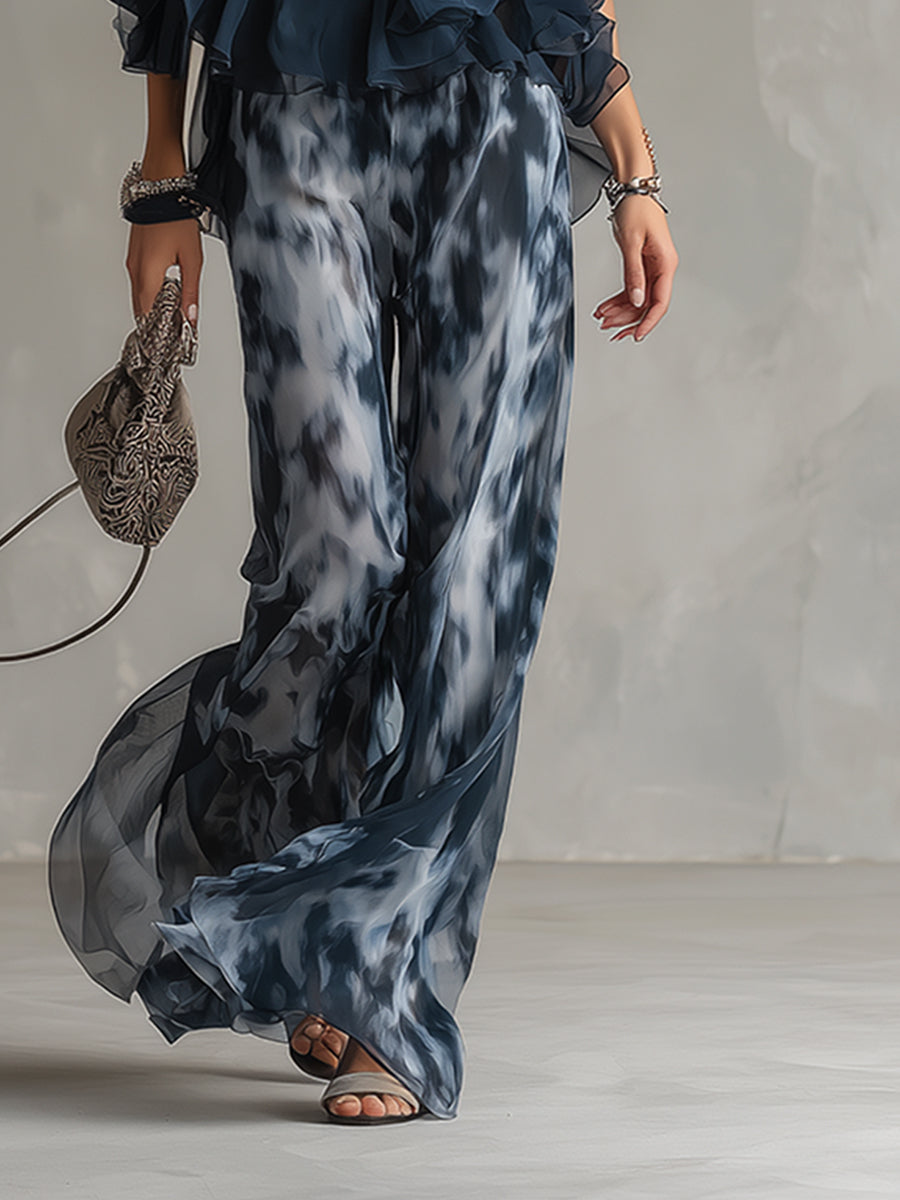 Conjunto Elegante en Chiffon con Top de Cuello Alto y Pantalones Anchos Estampados